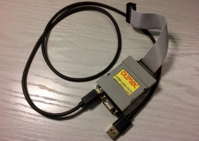 Olimex ARM-USB-OCD interface & cables.